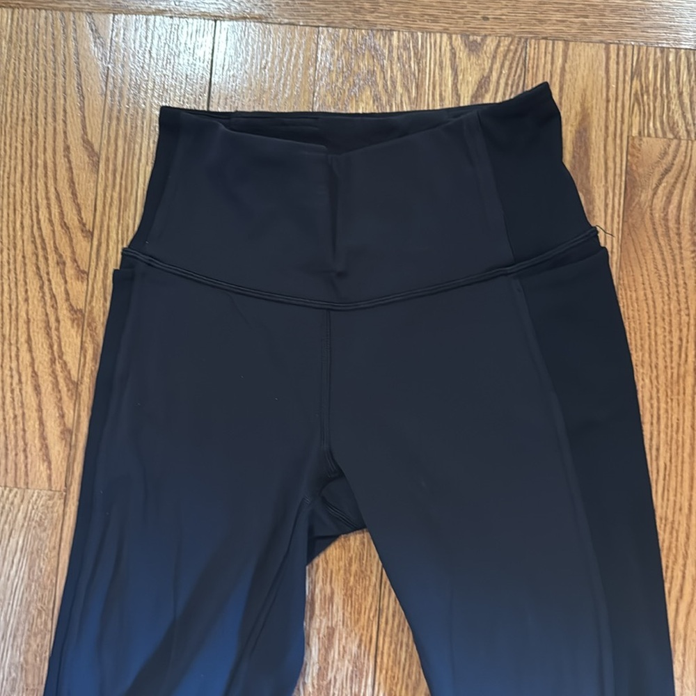 Like new - Lululemon ribbed panel leggings. Black. Size 6.